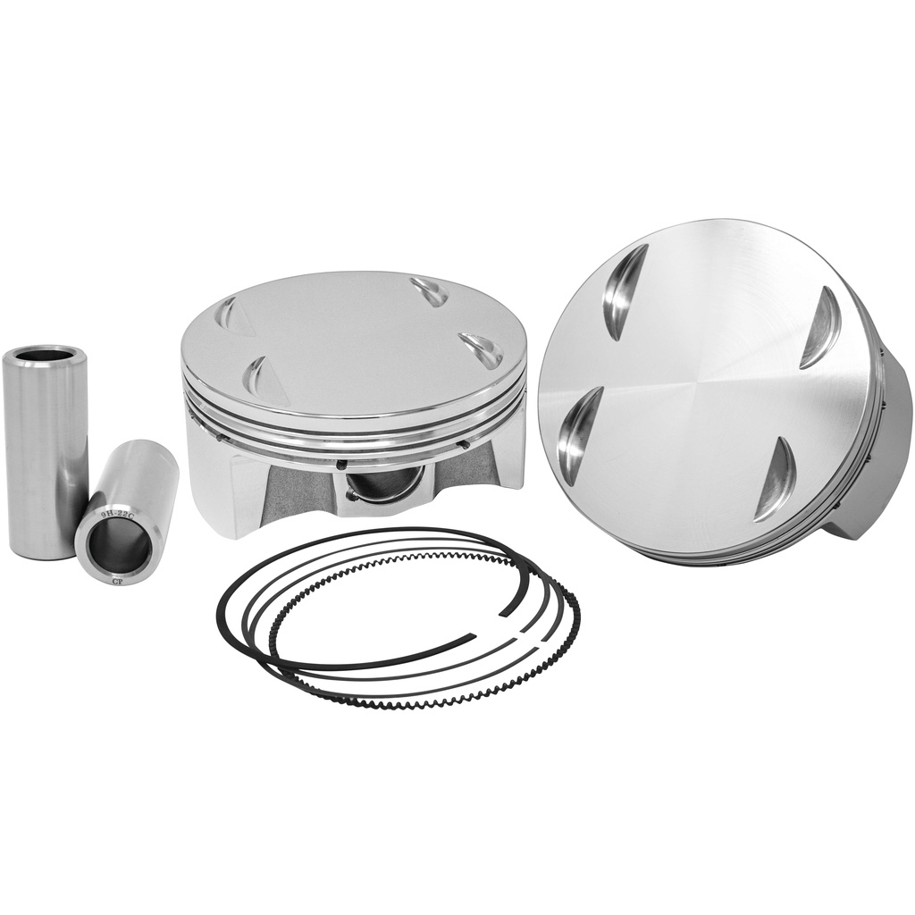 Harley-Davidson M-8 CP Forged Pistons | Vance & Hines Motorsports Two metal engine pistons with piston rings and wrist pins laid out on a white background, showing a piston kit assembly.